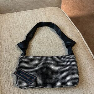 Black rhinestone purse with knot handle design